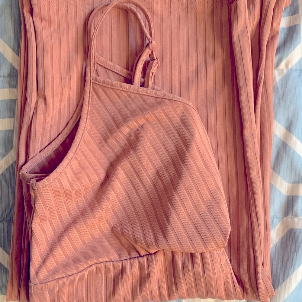 Maternity self belted rib- knit slip jumpsuit. Color is dusty pink.